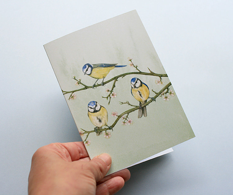 A6 CARD – blue tits sitting on a tree branch_front.